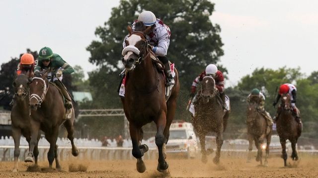 Tiz the Law, with jockey Manny Franco riding,