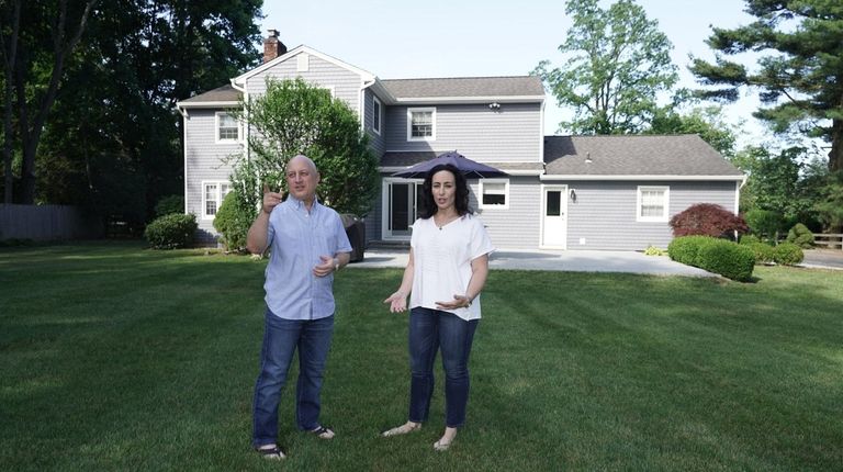 Randi and Michael Jaffe in the backyard of