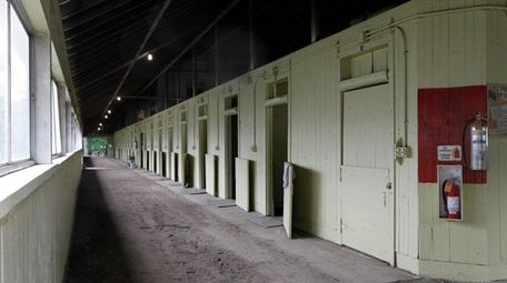 An empty barn at Belmont Park on June