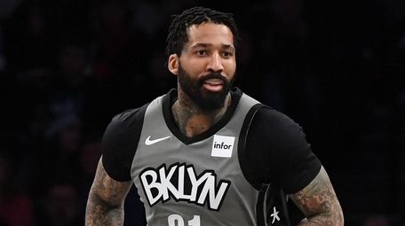Wilson Chandler runs upcourt during the Nets' game