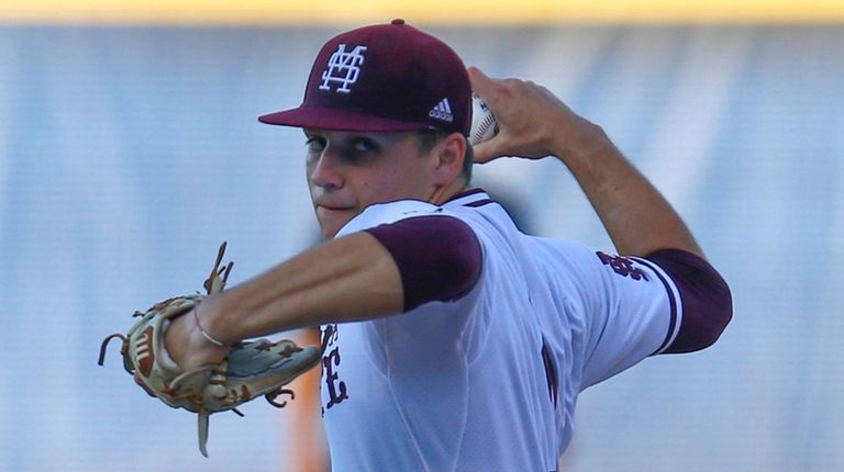 Mississippi State pitcher JT Ginn throws during the