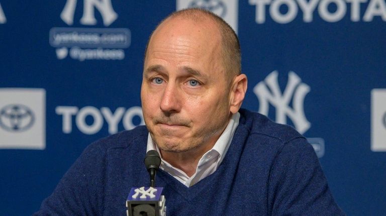 Yankees GM Brian Cashman speaks at a press