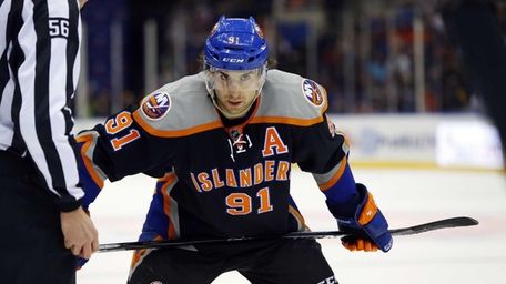 John Tavares looks on in the first period