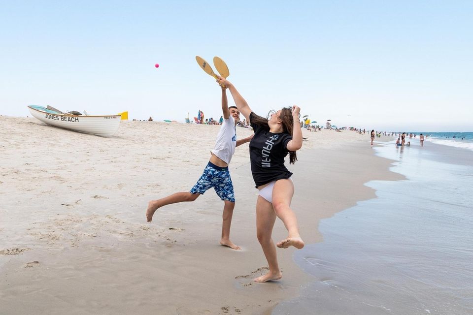 Cousins John Smithe of Bayside, 13, left, and