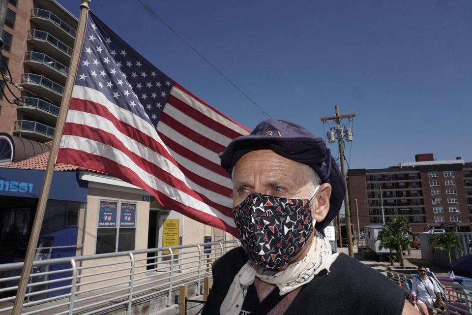 Fred Shwom, 74, of Lynnbrook, wears a mask