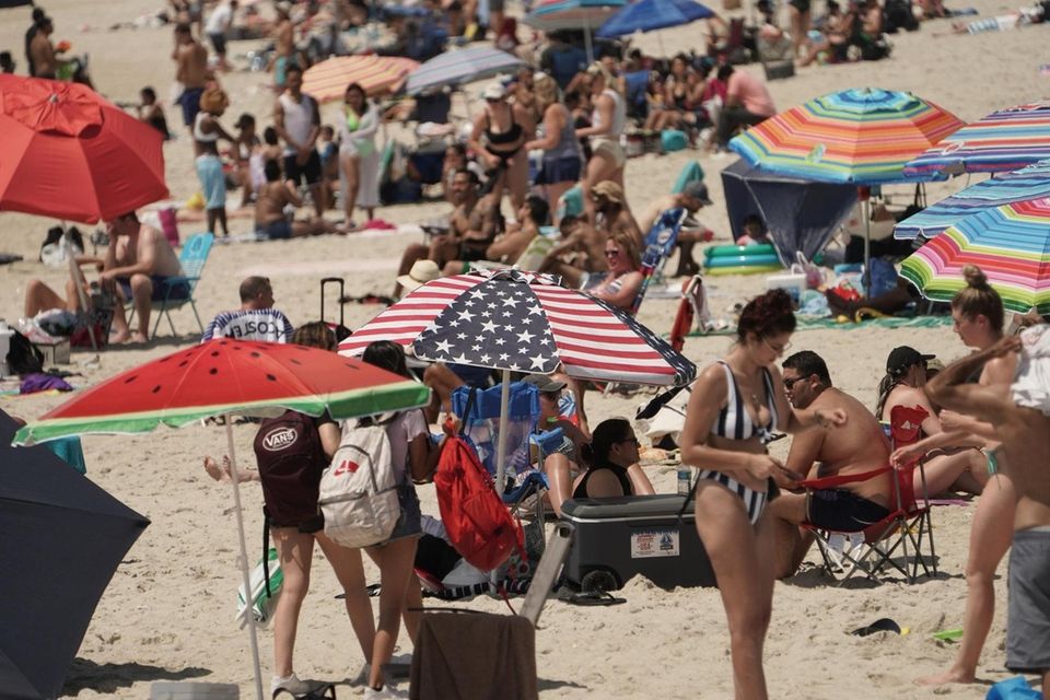 People enjoying the holiday at Jones Beach on