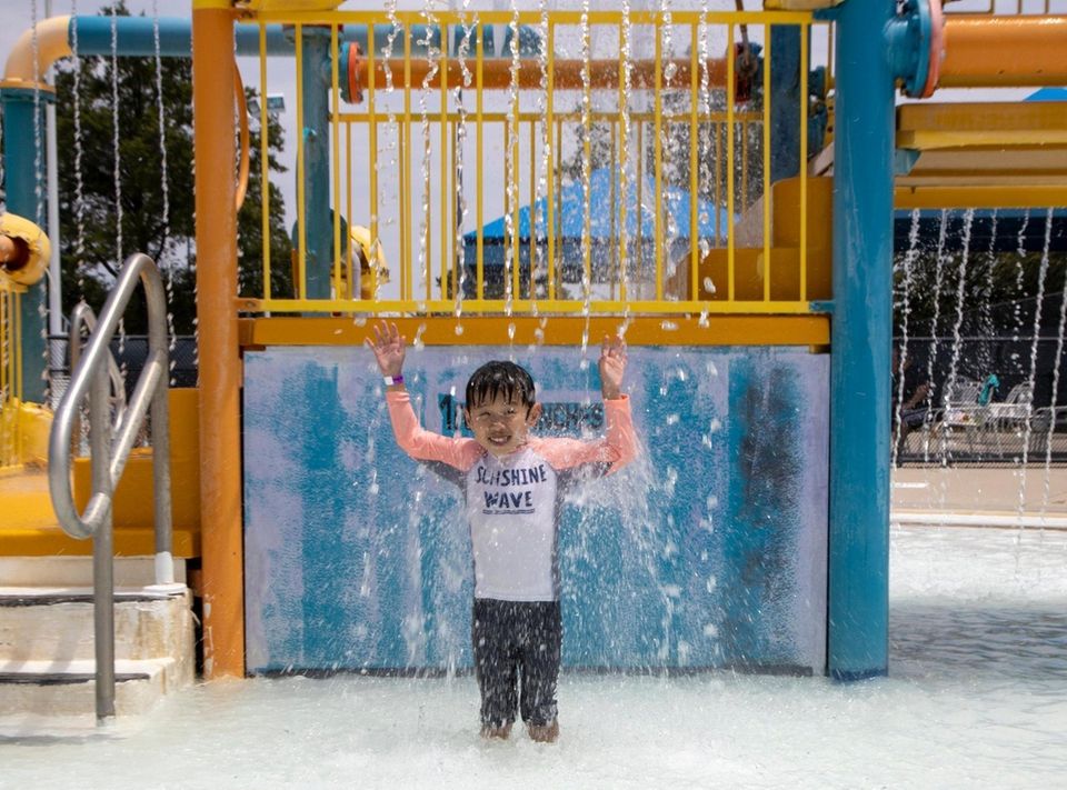 Nathan Ban, 5, Old Westbury enjoy the splash