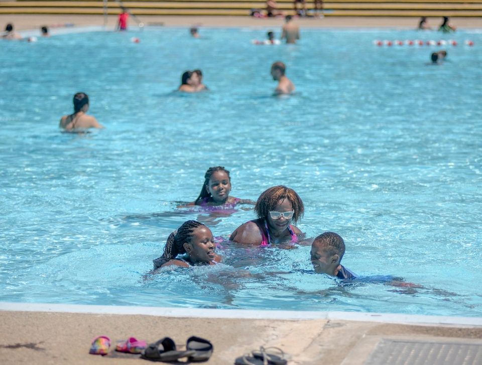 East Meadow resident Marie Lindor plays water games