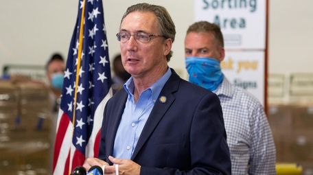 State Sen. James Gaughran speaks during an event