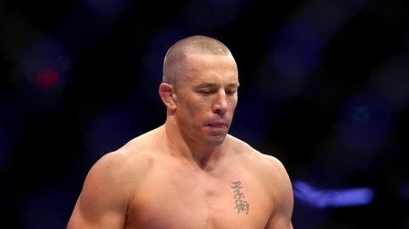 Georges St-Pierre enters the octogon for his UFC