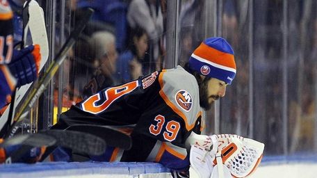 Rick DiPietro of the Islanders looks on from