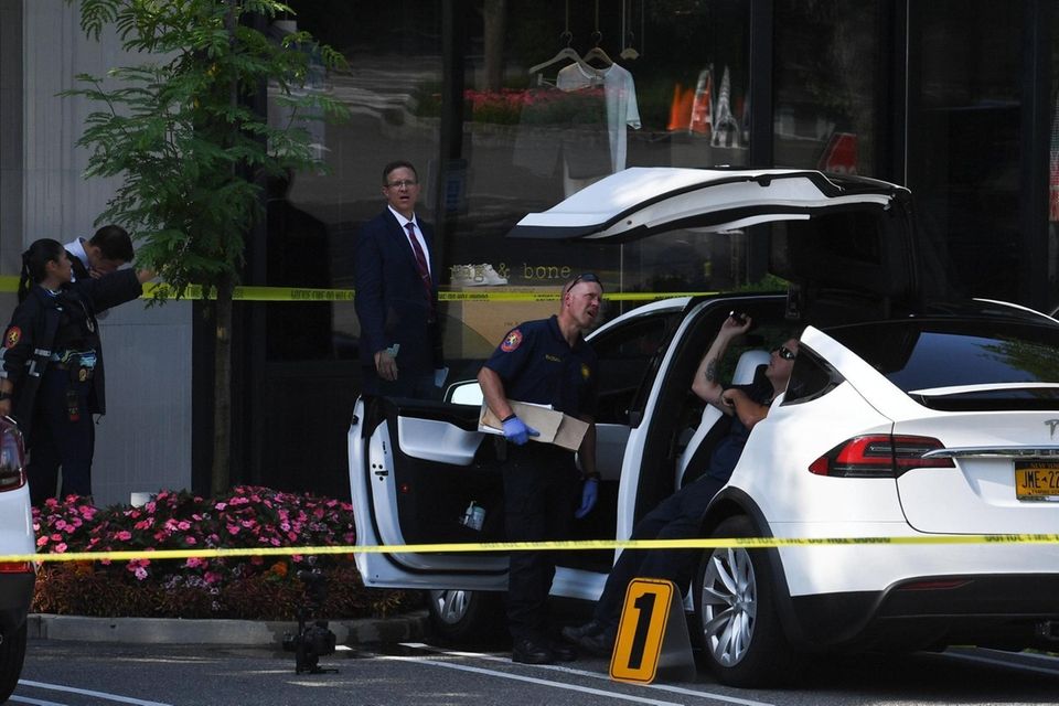 Nassau County Police investigate the report of a