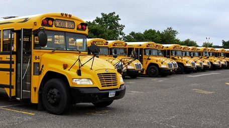 School buses sit in Ronkonkoma on July 7.