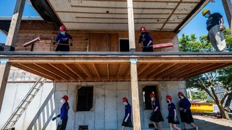 Orthodox Jewish teen girls help rebuild the home