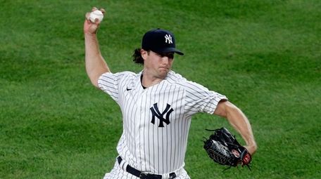 Gerrit Cole #45 of the Yankees pitches during