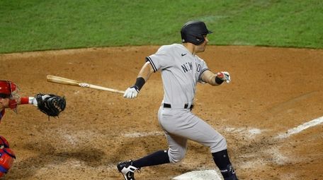 The Yankees' Mike Tauchman hits an RBI double