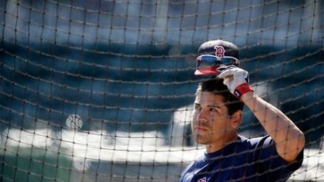 Boston Red Sox outfielder Jacoby Ellsbury looks on