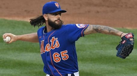 Mets starting pitcher Robert Gsellman delivers against the