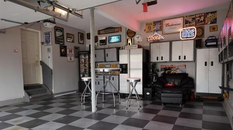Robert Roth's car- and beer-themed garage in Manorville.