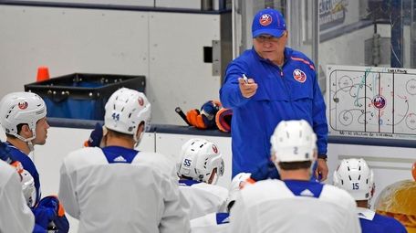 Islanders head coach Barry Trotz instructs to his