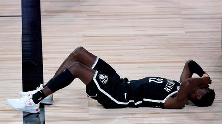 Brooklyn Nets' Caris LeVert reacts after inadvertently getting