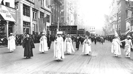 Dr. Anna Shaw and Carrie Chapman Catt leading