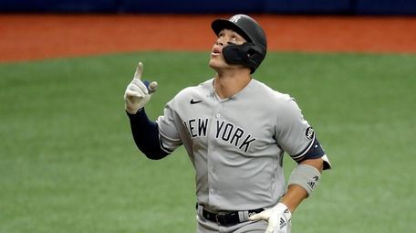 New York Yankees' Aaron Judge celebrates after hitting