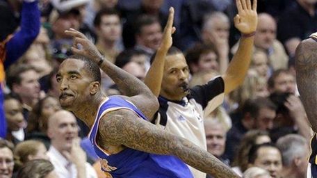 J.R. Smith celebrates after a making a three-pointer