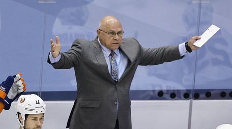 Barry Trotz of the New York Islanders argues