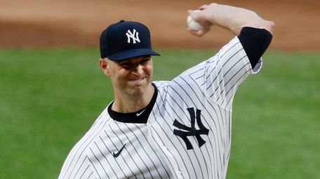 J.A. Happ of the Yankees pitches during the