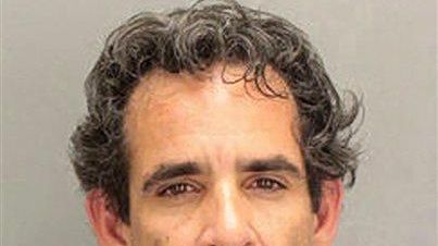 This undated booking photo provided by the Miami-Dade