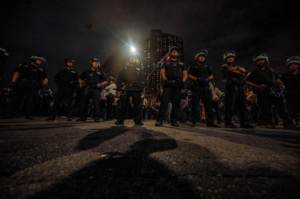 Police guard the entrance to the Manhattan Bridge