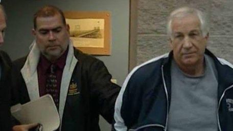 Jerry Sandusky, right, 69, was convicted of 45