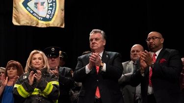 U.S. Rep. Pete King, center, attends a ceremony