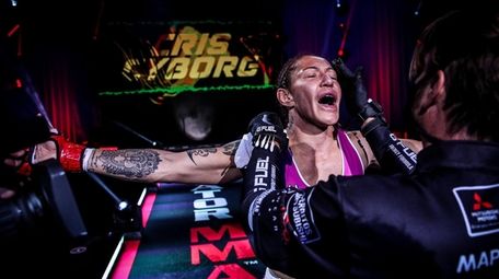 Cris Cyborg defended her featherweight title with a