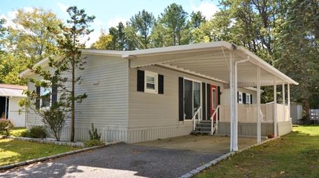 This two-bedroom, two-bath mobile home in the Riverwoods