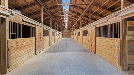 A 17-stall stable and storage barn can be