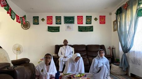 Zahra Bootwala, 40, and her family worship at