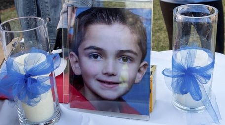 Photo from a candlelight vigil for 8-year-old Thomas