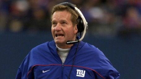 Giants head coach Jim Fassel reacts on the