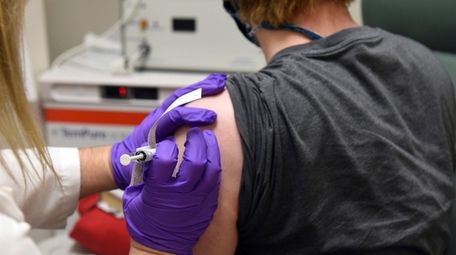 A patient enrolled in Pfizer's COVID-19 coronavirus vaccine