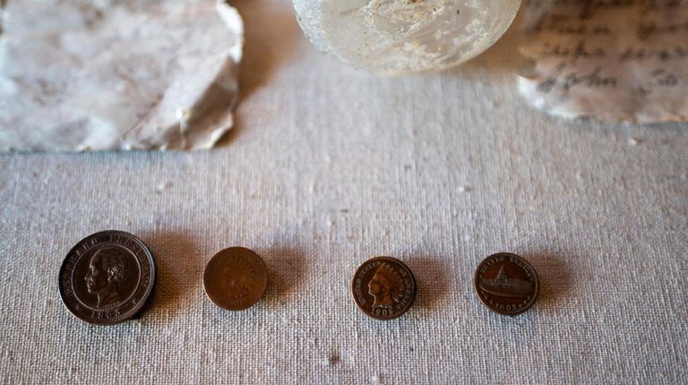 The coins that were found in the bottle.