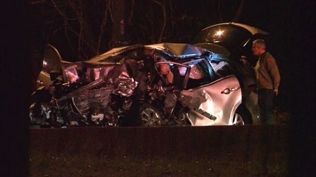 Investigators at the scene of a fatal wrong-way
