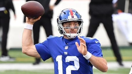 Colt McCoy of the Giants throws a pass