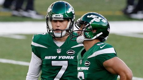 Braden Mann of the Jets reacts with teammate