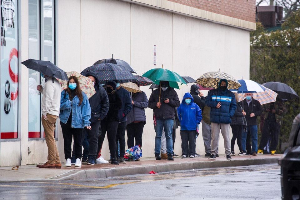 People use umbrellas to shield themselves from the