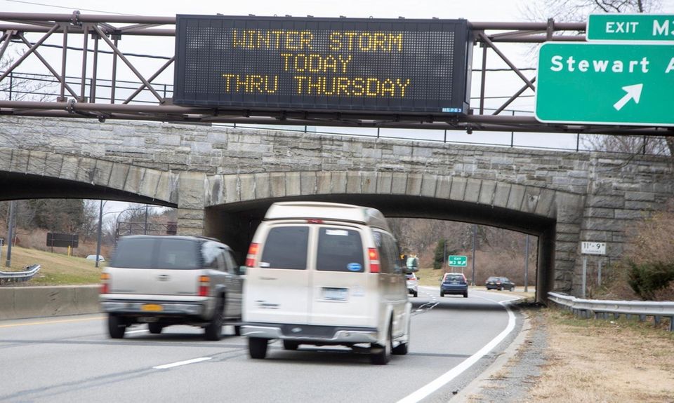 Winter storm warning signs on the northbound Meadowbrook