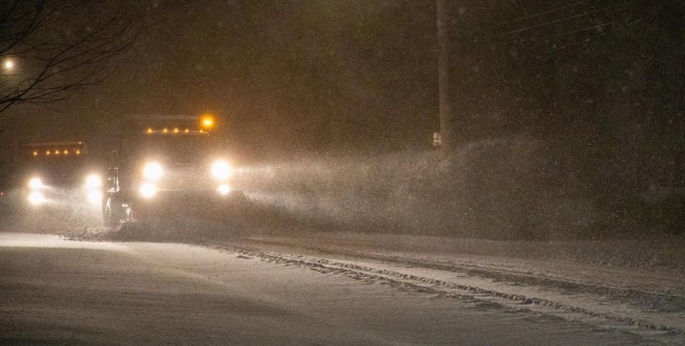 Plows clear snow on Shore Road in Setauket