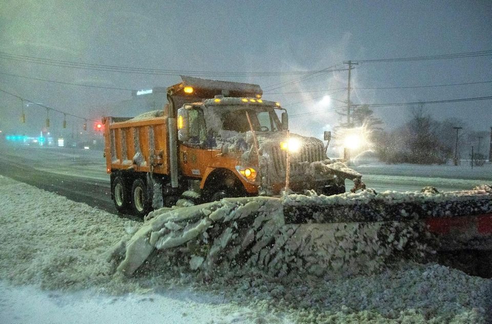 Plows try to keep Old Country Road clear
