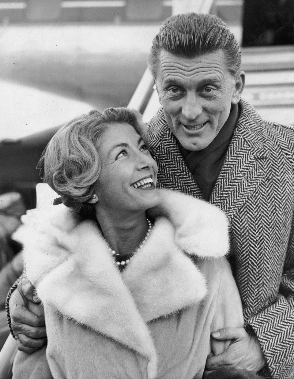 5th December 1960: Kirk Douglas and his wife